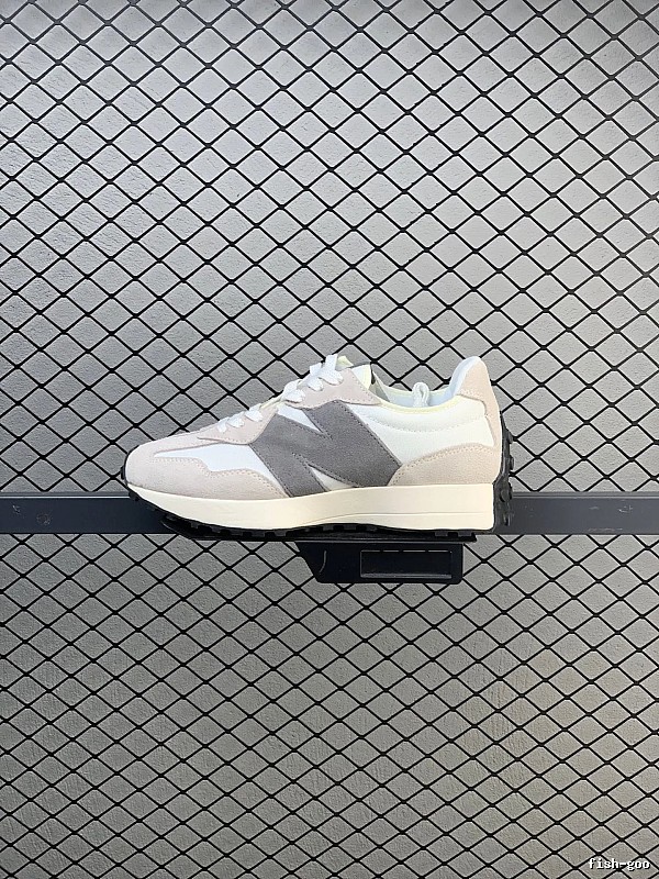 New Balance Gray Retro Runners Highlighting Road Runner Profile