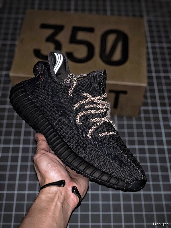 Yeezy Black Knit Sneakers Defined by Sock-Like Collar